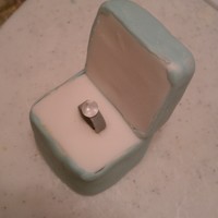 Ring Box These are individual ring boxes made for a friend's engagement party. The box is cake covered in fondant with RKT lid also covered in...