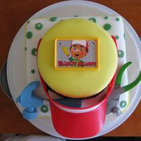 Handy Manny Birthday Cake This was a fun cake to make for a 3 year old boy's birthday party...and very last minute! Yellow WASC cake with white chocolate...