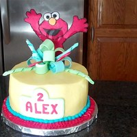 Elmo Design based on many CC Elmo cakes. This one gave me fits for some reason......had a bulge and then my BC slid off (a first)! So I scraped...