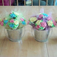 Pastel Cupcake Bouquets Made these as "thank yous" for my daughters' religious ed teachers. Cupcakes were mix of white and chocolate cake with...