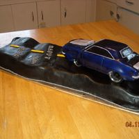 Camaro, 36Th Bday Cake This a camaro and road cake that I made for my husbands 36th Bday. When placing the car onto the road.. It made a wrong turn.....the front...