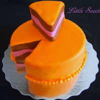 A Piece Of Cake! Chocolate cake with buttercream and rolled fondant.