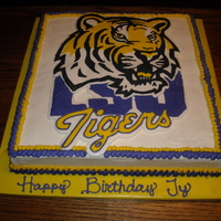 Lsu White cake with frozen buttercream transfer.