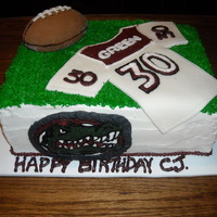 Cj BC with fondant accents. Gator logo of a local high school mascot.