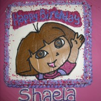 Shaela FBCT Dora the Explorer on cream cheese icingand strawberry cake.