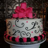 Swirls 10 inch round pan. BC with Fondant accents. I used Wilton's stencil press for the swirls