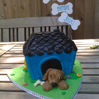 Golden Retriever Cake Golden Retriever in a wonky dog house. Fondant & gum paste details.