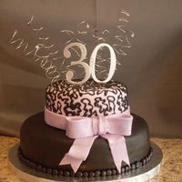 The Big "30" This was my first stacked cake.. I think it turned out pretty good. They said it tasted wonderful and they loved it so I guess I did good...
