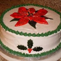 Poinsettia Christmas Cake This was my very first cake I made using gum paste flowers. Never took a class just went to the store bought it sat down and made it. The...