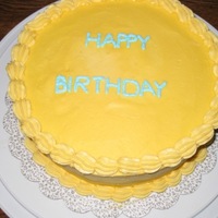 Plain Birthday Cake This is pretty plainly decorated, but I used it more for trying techniques than anything else. I baked it with a flower nail, and I'm...