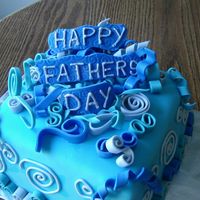 Fathers Day Vanilla cake with strawberry filling. Covered with fondant and fondant accents.