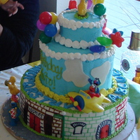 Sesame Street Birthday Cake 1/2 butter cream, 1/2 fondant and some characters.