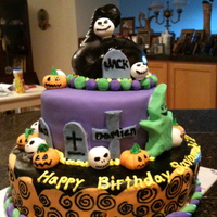 Nightmare Before Christmas Cake This was a birthday cake for my sister. All the figurines were made out of gumpaste and the cover is MMF.