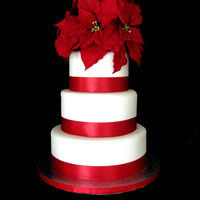 Poinsettia Wedding Cake Customer asked for a simple wedding cake with Poinsettias... I didn't have time to make them out of gumpaste this time, so silk...