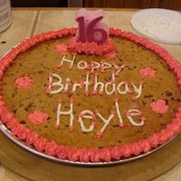 Sweet 16 - Cookie Cake Chocolate Chip Cookie Cake - 16 inchDecorated with pink and white buttercream. My first attempt at a cookie cake