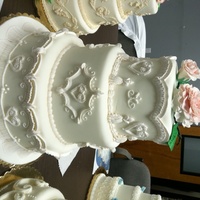 Culinary School Final Wedding Cake Project This was my final wedding cake design for my level 3 class in Culinary School. Cakes are styrofoam, decorated in royal icing and gumpaste...