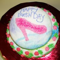 Birthday Cake This cake was for my sister's birthday. My 15 year old decided she wanted to decorate it by herself. She free handed the shoe. Has...