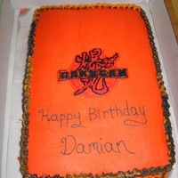 Bakugan Golden/Chocolate Cake with Devils Food Cake Bakugan Ball. Ball is covered (badly) with MMF. Cake is buttercream icing but I had a tough...