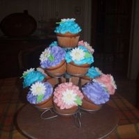 Colourful Daisy Cupcakes I made these for a reunion with a few friends from high school.