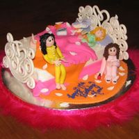 Slumber Party Pillow Fight 8" square cut down to 6x8" to create bed. head and foot boards are gumpaste dusted in gold pearl dust and everything else is...