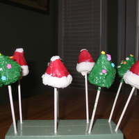 Christmas Cake Pops In the style of bakerella of (www.bakerella.com)! Red velvet cake pops with cream cheese frosting and CK candy melts & sanding sugar/...