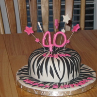 Zebra & Hot Pink! Chocolate cake with chocolate fudge frosting. Covered in MMF with MMF accents, brushed with luster dust. First attempt at zebra stripes....