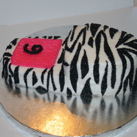 Zebra Slipper Marble cake with vanilla buttercream, hot pink buttercream and black sugar frosted fondant zebra stripes (try saying that 5 times fast, lol...