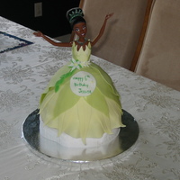 Princess Tiana Princess Tiana from 'The Princess and the Frog'. Didn't realise until I'd baked the cake (in the wilton wonder mold pan...