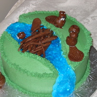 Beaver Dam 10" round marble cake filled with vanilla buttercream, buttercream with chocolate MMF beavers & logs. Many thanks to Candygirl75 (...