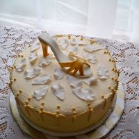 First High Heel 8in marble with fondant rose petals ( they didn't turn out so good) and high heel shoe. I did ivory color bc on top and gold color on...