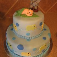Baby Boy Elephant Shower Cake WASC cake with mmf covering. I used Wilton fondant to make the pieces on the top.