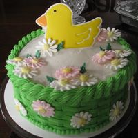 Course 2 Cake First attempt at basketweave, daisies, and color flow. Need more practice, but had fun!