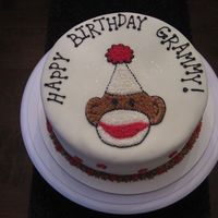 Sock Monkey Birthday Cake This was a birthday cake for my mom! Buttercream on mmf-covered cake.