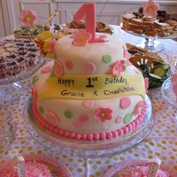 First Birthday Cake For Twins I made this for my own twin daughters' first birthday. WASC cake, mmf, Wilton fondant and buttercream accents.