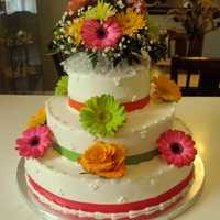 75Th Birthday fresh daisies & roses...top layer pineapple filling, middle layer is almond cake & bottom cake is butter cake