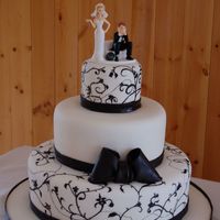 Black And White Wedding 4-8-12 chocolate and vanilla cakes, chocolate icing covered with fondantmy second wedding cake!!! I'm REALLY happy with the results!!!...