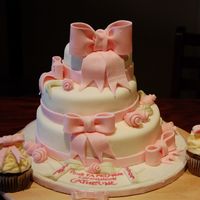 First Communion Cake chocolate cake iced in vanilla buttercream2 gluten free cupcakes