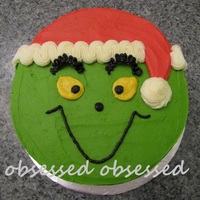Grinch Saw this one done by Megs1025 and loved it! I knew immediately that this was the cake I wanted to make for the kid's Christmas party...
