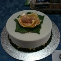 Baby Shower Cake chocolate mint mud cake covered in white fondant.