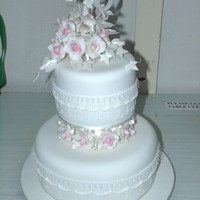 Wedding Cake - Pink & White This is my 1st wedding cake - done as a final level in class and have now graduated. I got the idea from a cake that had fresh flowers in...