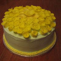 Yellow Rose Cake Green icing, with hand made yellow fondant roses.