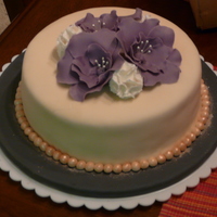 Fantasy Flower Cake fondant covered cake with fondant fantasy flowers and carnations