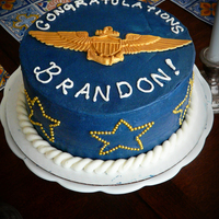 Winging Cake My husband got his Naval aviator wings, and so I made him a cake because it's what I do. It's a chocolate cake with peanutbutter...