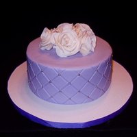 Purple Diamonds Chocolate WASC with milk choco ganache filling. Indydebi buttercream with gumpaste roses.