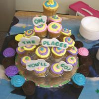 Oh The Places You'll Go Cupcake Tower This is a cupcake tower decorated to look like the cover of Oh the Places You'll Go by Doctor Seuss. The cupcakes were for a preschool...