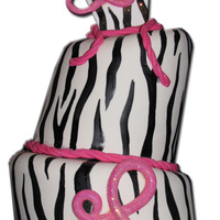 The Lindsay Ii Zebra Print cake with Gumpaste accessories for the 22, L and top back panel