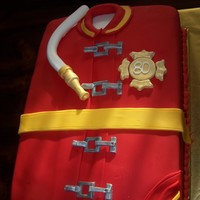 Fireman Jacket A 80th birthday cake for a retired fireman.. Chocolate Espresso, Banana sour cream and vanilla layers with Sweet and Savory buttercream(by...