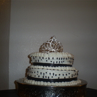 Black & White Birthday Cake. Vanilla cake w/BC icing and black ribbon.