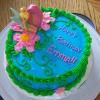 Tinkerbell Chocolate cake decorated in buttercream. Tinkerbell candle