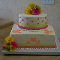 Alabama Royal Wedding 12"square 8" round White cake, white buttercream icing, fresh flowers